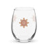 The front side of a stemless wine glass featuring the Fire Colour iteration of the Morning Star Fire Celtic knot design.