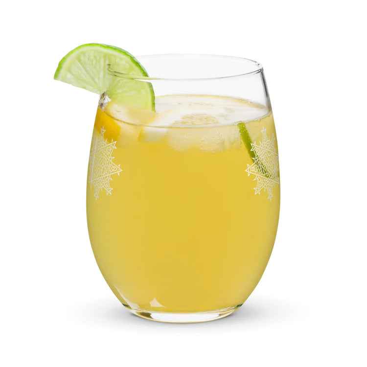 The back side of a stemless wine glass, filled with a refreshing cocktail, featuring the Solid White iteration of the Morning Star Fire Celtic knot design. The Morning Star Fire Celtic knot symbolizes the Sun.