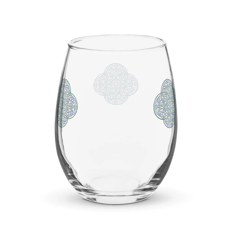 The back side of a stemless wine glass featuring the Living Colour iteration of the Reach Of The Spirit Celtic knot design.