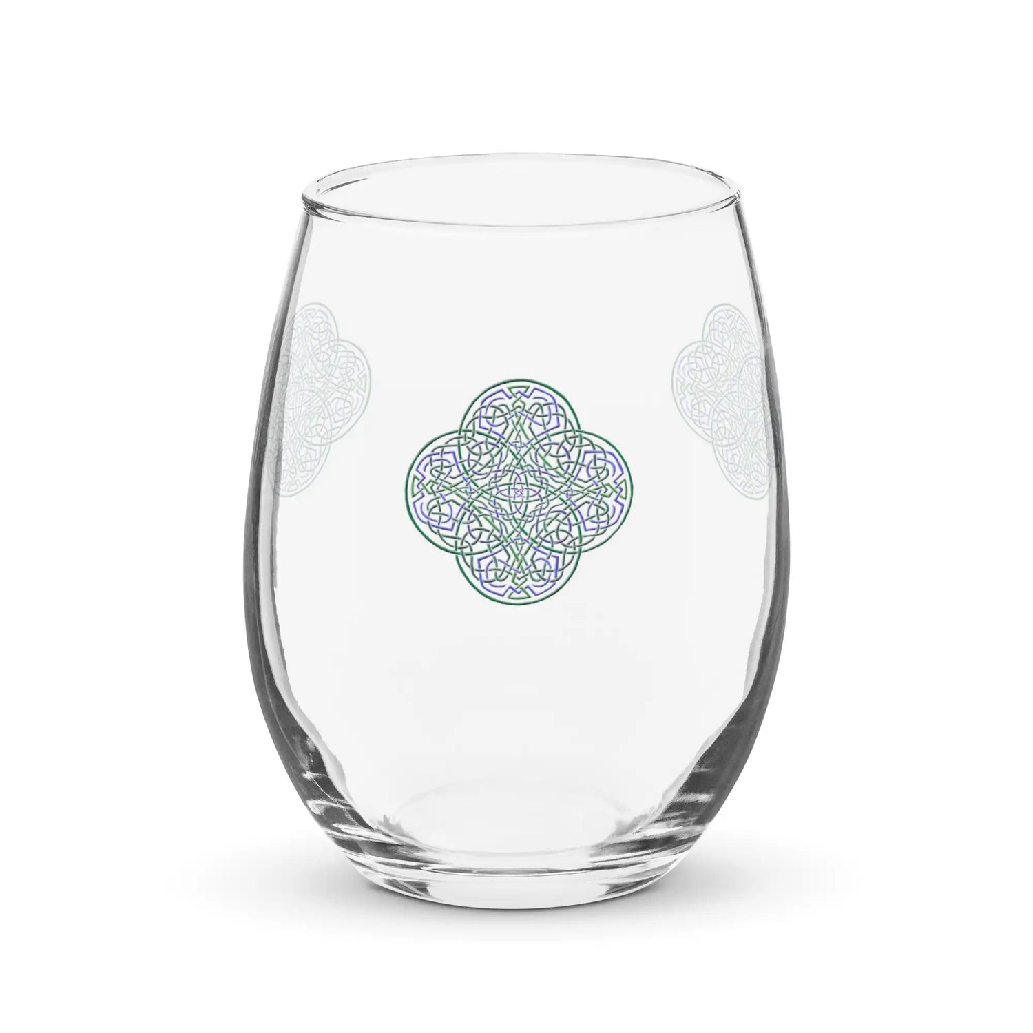 The front side of a stemless wine glass featuring the Living Colour iteration of the Reach Of The Spirit Celtic knot design.