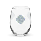 The front side of a stemless wine glass featuring the Living Colour iteration of the Reach Of The Spirit Celtic knot design.