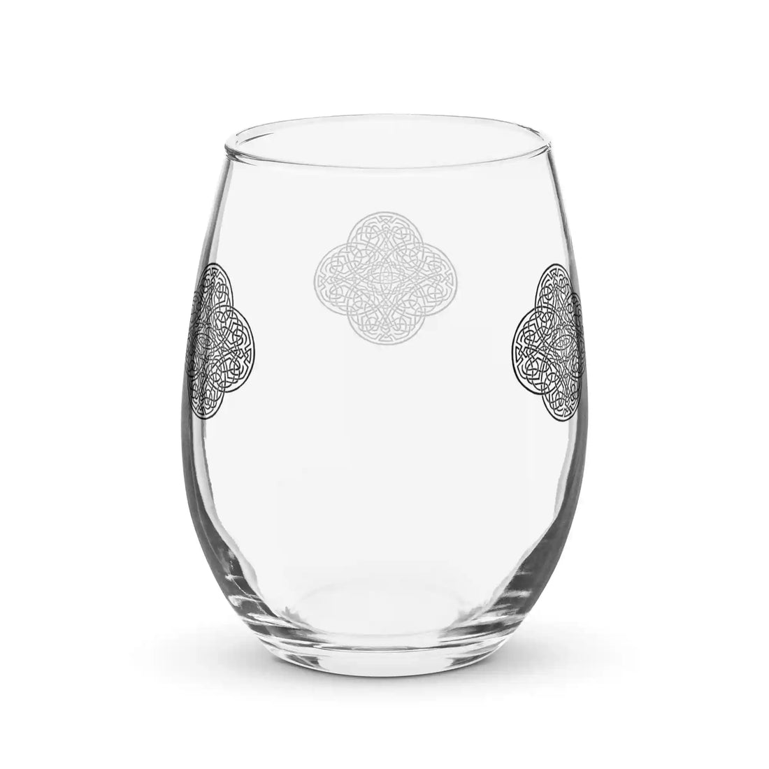 The back side of a stemless wine glass featuring the Solid Black iteration of the `Reach Of The Spirit` Celtic knot design. The `Reach Of The Spirit` Celtic knot is an Earth symbol.
