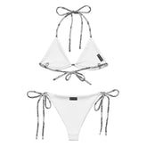 A view of the inside of a string bikini featuring the Inverted Black & White Solid Cosmos iteration of the Morning Star Fire Celtic knot pattern.