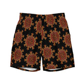 The front side of a pair of Xigfireon graphic swim trunks featuring the Fire Colour Black (small) patterned series of the Morning Star Fire Celtic knot design.