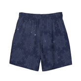 Celtic knot swim trunks by Xigfireon, shown from the back, featuring the Midnight Blue Cosmos patterned series of the `Morning Star Fire` design.
