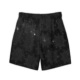 Celtic knot swim trunks by Xigfireon, shown from the back, featuring the Midnight Cosmos patterned series of the `Morning Star Fire` design.