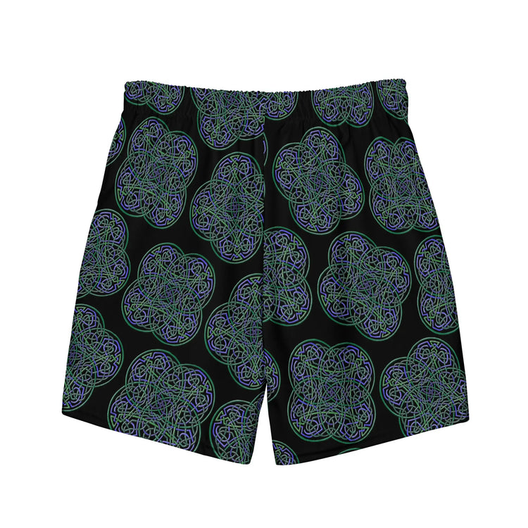 The back side of a pair of Xigfireon graphic swim trunks featuring the Living Colour Black (small) patterned series of the Reach Of The Spirit Celtic knot design.