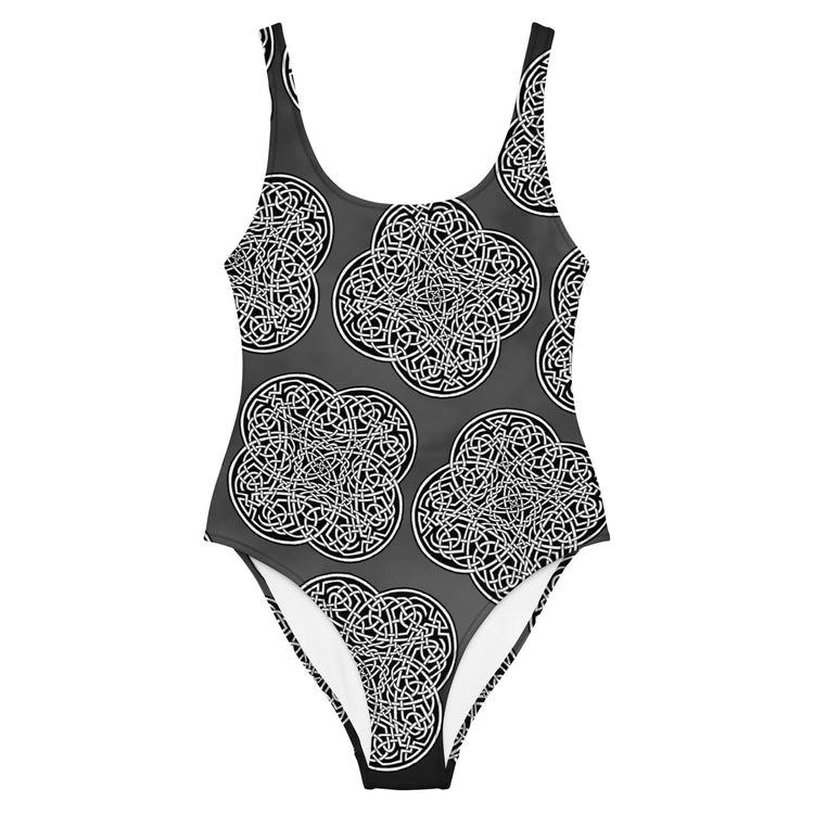 The front side of a Xigfireon graphic swimsuit featuring the Black & White Solid Forest patterned series of the Reach Of The Spirit Celtic knot design.