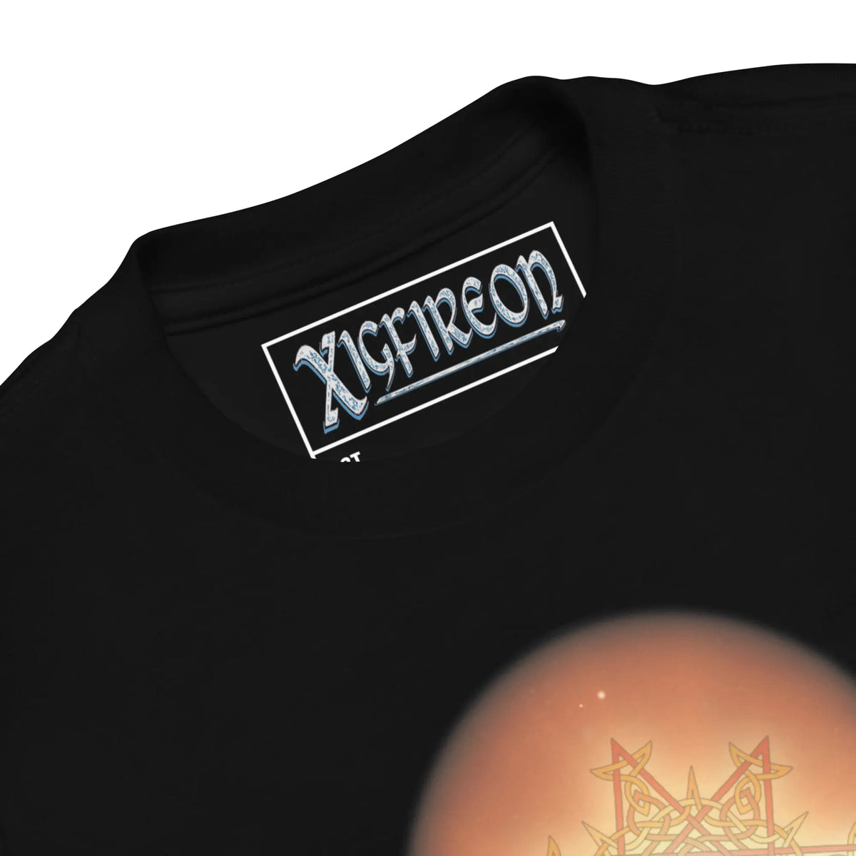 A close-up view of the logo and design on a black Xigfireon toddler graphic t-shirt featuring the Derivation II Celtic knot merger design symbolizing the Sun and the Earth in their cosmic dance.