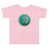 A pink Xigfireon toddler graphic t-shirt featuring the Deep Forest iteration of the Reach Of The Spirit Celtic knot design. The Reach Of The Spirit Celtic knot symbolizes Mother Earth.