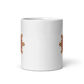 The front side of a Xigfireon white ceramic 11oz mug featuring the Fire Colour iteration of the Morning Star Fire Celtic knot design. This Celtic knot symbolizes Father Sun.
