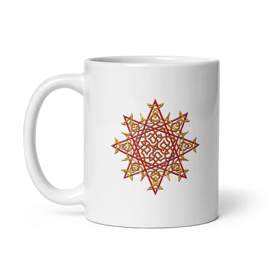 A Xigfireon white ceramic 11oz mug featuring the Fire Colour iteration of the Morning Star Fire Celtic knot design. This Celtic knot symbolizes Father Sun.
