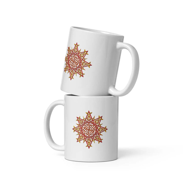 A stack of two Xigfireon white ceramic 11oz mugs featuring the Fire Colour iteration of the Morning Star Fire Celtic knot design. This Celtic knot symbolizes Father Sun.