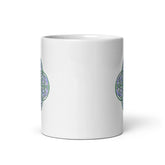 The front side of a Xigfireon white ceramic 11oz mug featuring the Living Colour iteration of the Reach Of The Spirit Celtic knot design. This Celtic knot symbolizes Mother Earth.