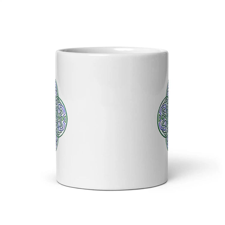 The front side of a Xigfireon white ceramic 11oz mug featuring the Living Colour iteration of the Reach Of The Spirit Celtic knot design. This Celtic knot symbolizes Mother Earth.