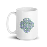A Xigfireon white ceramic 15oz mug featuring the Living Colour iteration of the Reach Of The Spirit Celtic knot design. This Celtic knot symbolizes Mother Earth.
