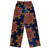 The back side of a pair of Xigfireon graphic wide leg pants featuring the Fire Colour Cosmos patterned series of the Morning Star Fire Celtic knot design.
