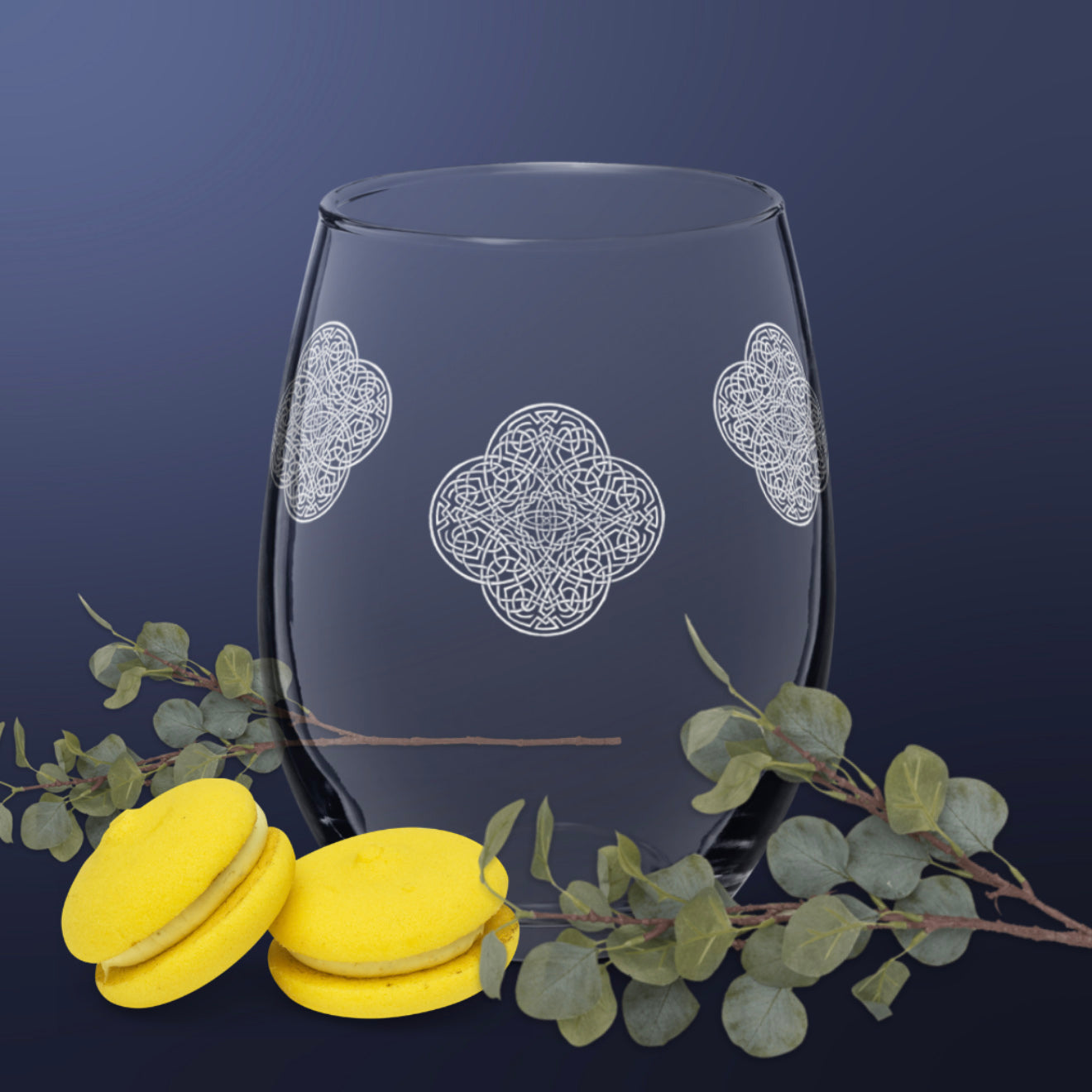 The front side of a stemless wine glass featuring the Solid White iteration of the `Reach Of The Spirit` Celtic knot design.