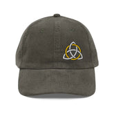 The front side of an olive green Xigfireon vintage corduroy cap embroidered with a White & Gold Celtic Trinity Knot, offset to the left.