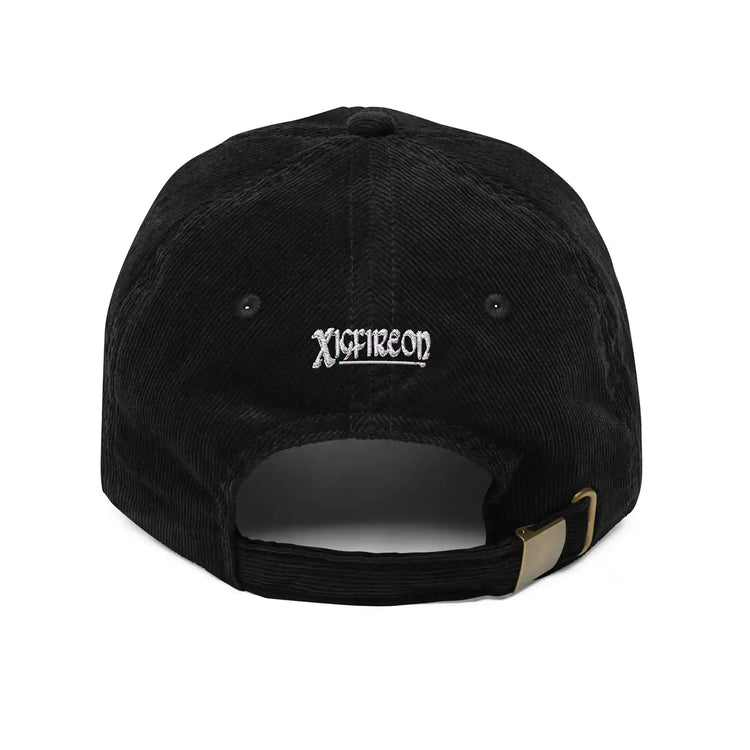 The back side of a black Xigfireon vintage corduroy cap showing the embroidered Xigfireon logo.