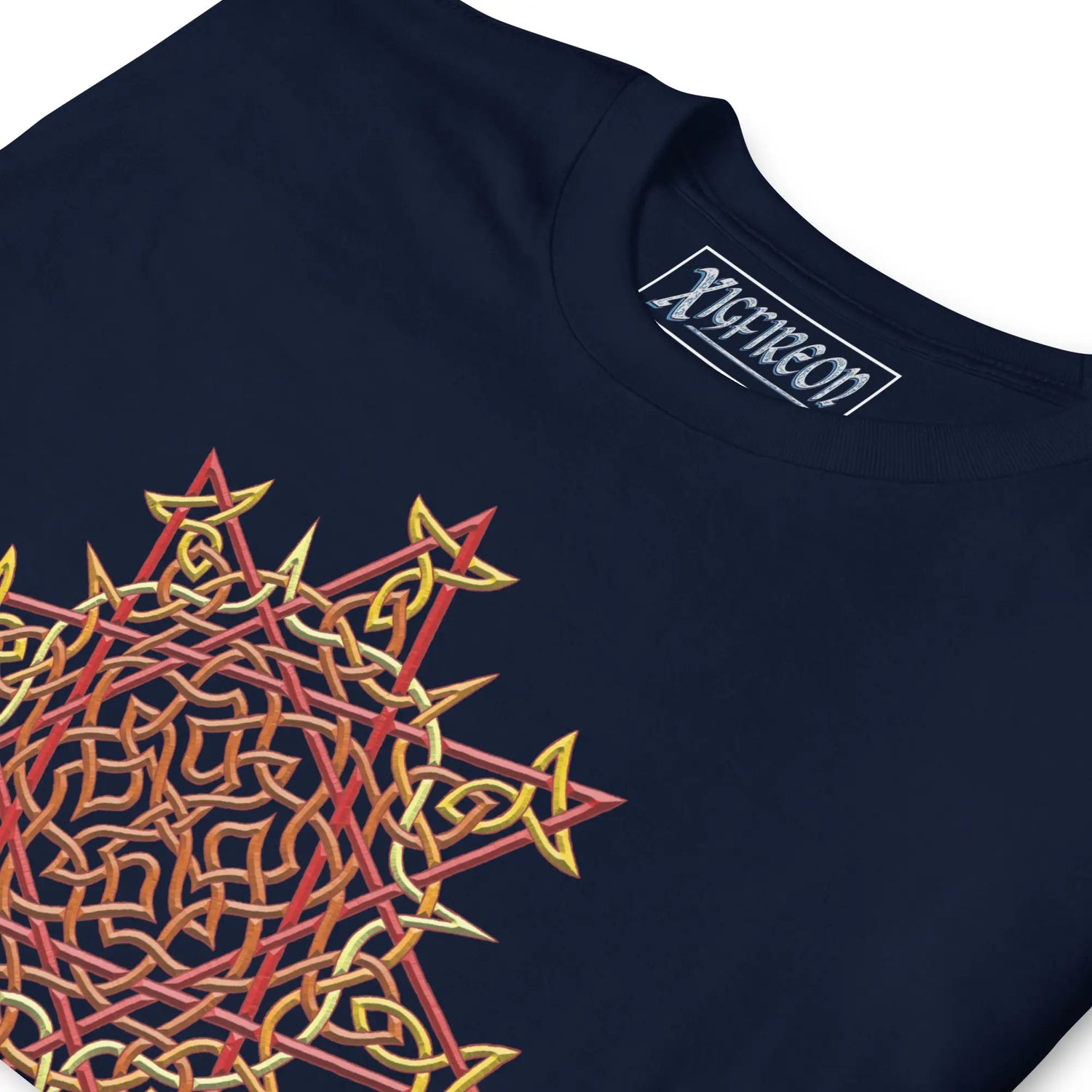 A close-up view of a navy blue Xigfireon graphic t-shirt featuring the Fire Colour iteration of the `Morning Star Fire` Celtic knot design. The `Morning Star Fire` Celtic knot symbolizes the Sun.