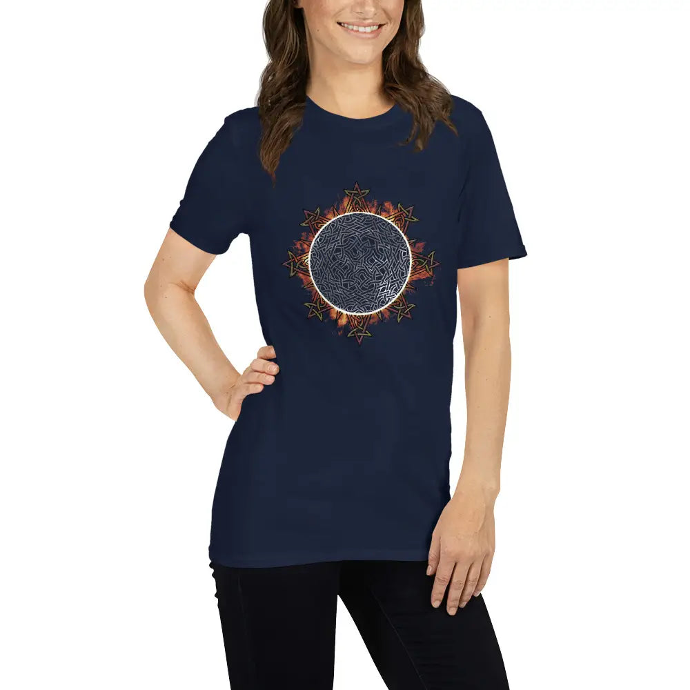 A young woman wearing a classic navy blue Xigfireon graphic tee featuring the Eclipsed iteration of the `Morning Star Fire` Celtic knot design, inspired by the Annular Solar Eclipse of 2023.