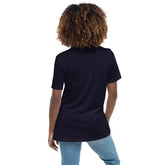 A young woman, viewed from behind, wearing a navy blue Xigfireon woman&