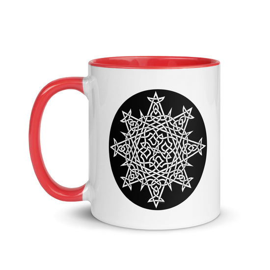 A Xigfireon white ceramic 11oz mug featuring the Black & White Circle iteration of the `Morning Star Fire` Celtic knot design, with red handle and inside. This Celtic knot symbolizes Father Sun.