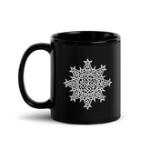 A Xigfireon black glossy 11oz mug featuring the Black & White Solid iteration of the `Morning Star Fire` Celtic knot design. This Celtic knot symbolizes Father Sun.