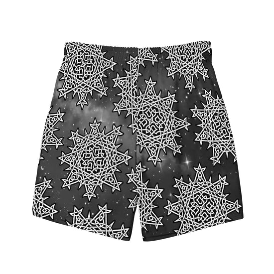 The back side of a pair of Xigfireon graphic swim trunks featuring the Black & White Solid Cosmos patterned series of the `Morning Star Fire` Celtic knot design.