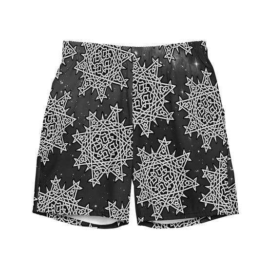 The front side of a pair of Xigfireon graphic swim trunks featuring the Black & White Solid Cosmos patterned series of the `Morning Star Fire` Celtic knot design.