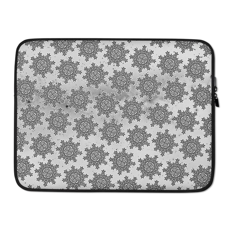 A 15 inch graphic laptop sleeve featuring the Inverted Black & White Solid Cosmos iteration of the `Morning Star Fire` Celtic knot pattern.