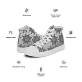 A list of product features surrounding a pair of canvas high tops featuring the Inverted Black & White Solid Cosmos iteration of the `Morning Star Fire` Celtic knot pattern. Features include white laces, sturdy canvas upper side, padded collar, lace-up front, breathable lining, soft insole, and EVA rubber outsole.