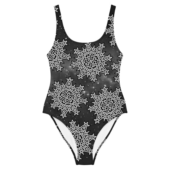 The front side of a Xigfireon graphic swimsuit featuring the Black & White Solid Cosmos patterned series of the `Morning Star Fire` Celtic knot design.