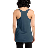 A young woman, viewed from behind, wearing an indigo Xigfireon graphic women&