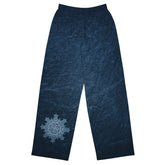 The front side of a pair of Xigfireon graphic wide leg pants featuring the Blue Slate iteration of the `Morning Star Fire` Celtic knot design.