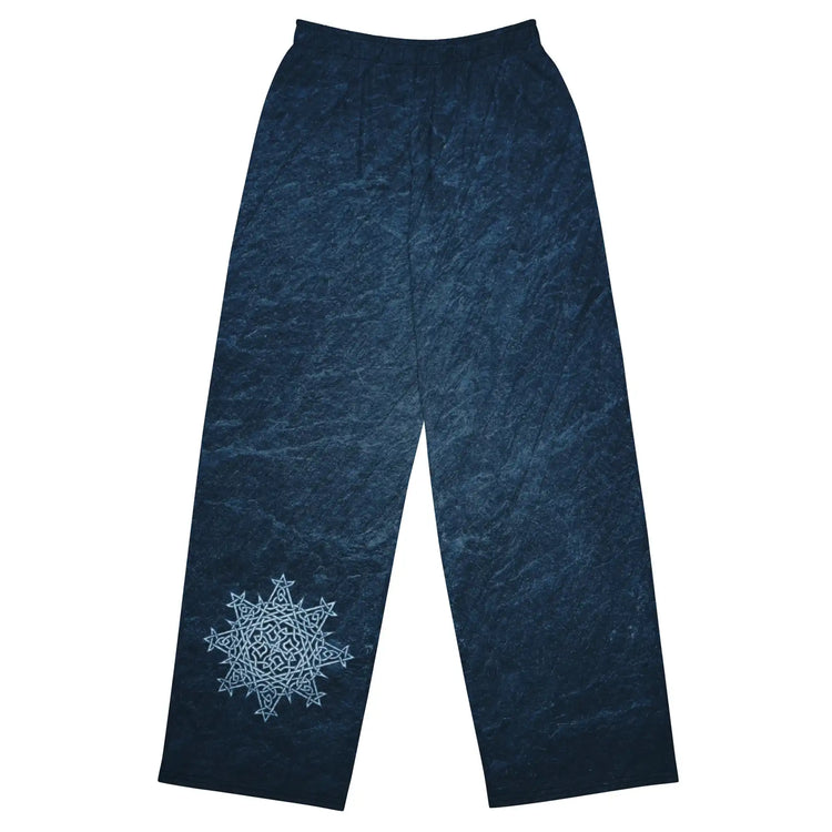The front side of a pair of Xigfireon graphic wide leg pants featuring the Blue Slate iteration of the `Morning Star Fire` Celtic knot design.