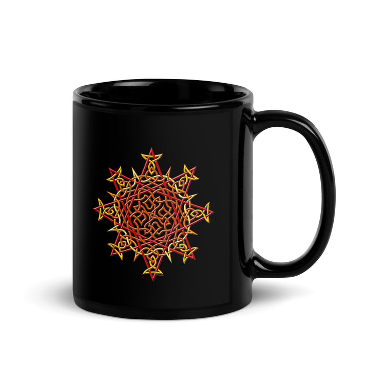 A Xigfireon black ceramic 11oz mug featuring the Fire Colour iteration of the `Morning Star Fire` Celtic knot design. This Celtic knot symbolizes Father Sun.