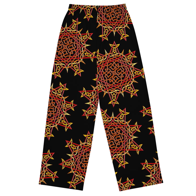 The back side of a pair of Xigfireon graphic wide leg pants featuring the Fire Colour Black patterned series of the `Morning Star Fire` Celtic knot design.