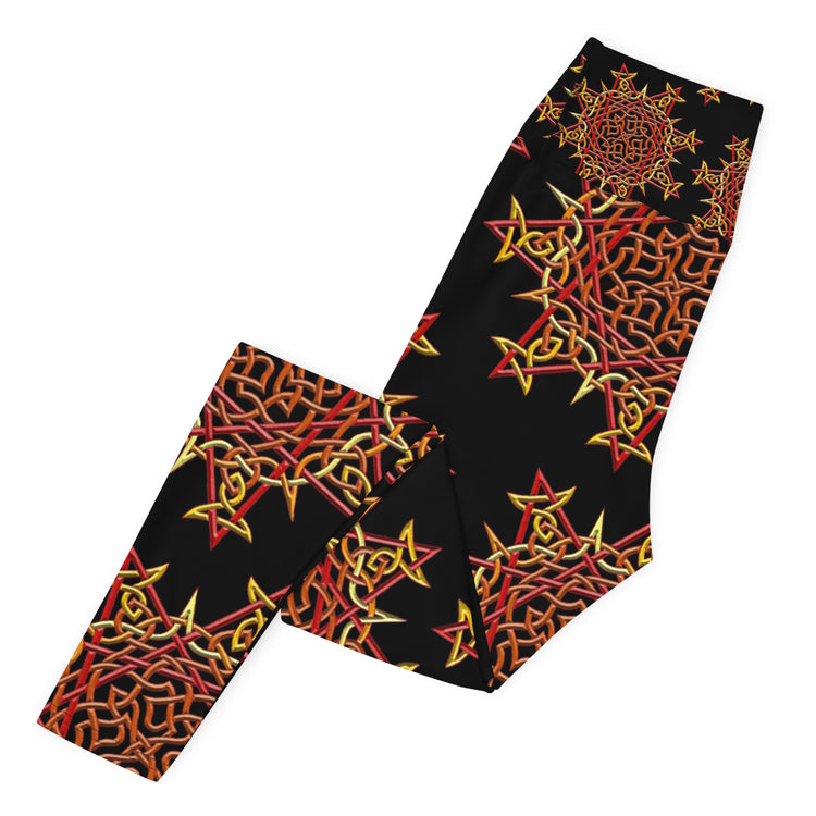 The left side of a folded pair of Xigfireon graphic yoga leggings featuring the Fire Colour Black patterned series of the `Morning Star Fire` Celtic knot design.