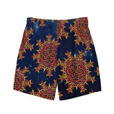 The back side of a pair of Xigfireon graphic swim trunks featuring the Fire Colour Cosmos patterned series of the `Morning Star Fire` Celtic knot design.