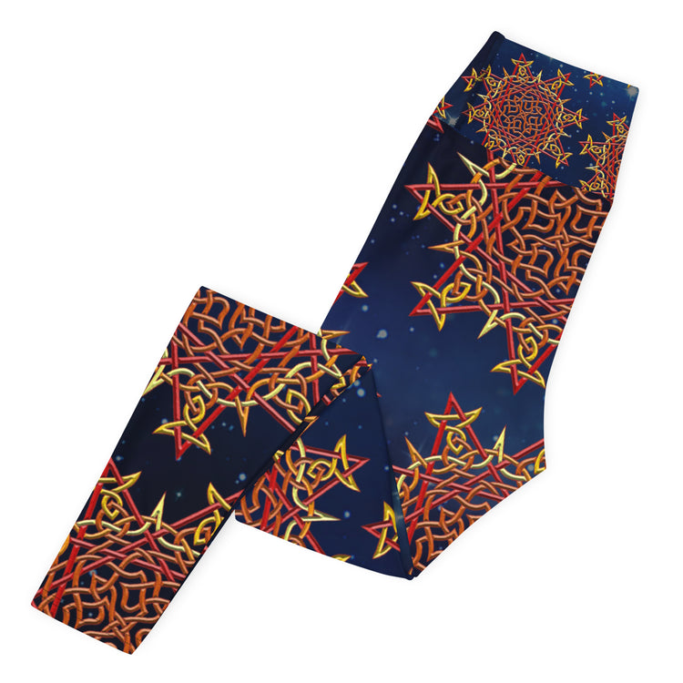 The left side of a folded pair of Xigfireon graphic yoga leggings featuring the Fire Colour Cosmos patterned series of the `Morning Star Fire` Celtic knot design.