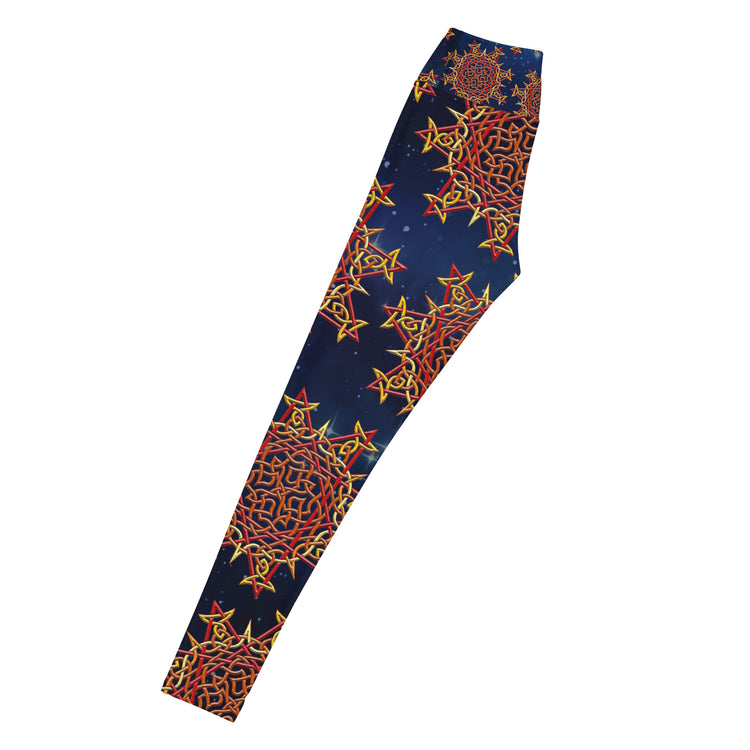 The left side of a pair of Xigfireon graphic yoga leggings featuring the Fire Colour Cosmos patterned series of the `Morning Star Fire` Celtic knot design.