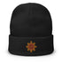 A black Xigfireon knit beanie embroidered with the Fire Colour iteration of the `Morning Star Fire` Celtic knot design.