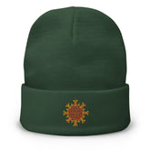 A dark green Xigfireon knit beanie embroidered with the Fire Colour iteration of the `Morning Star Fire` Celtic knot design.