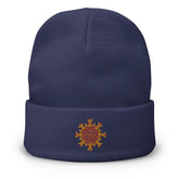 A navy blue Xigfireon knit beanie embroidered with the Fire Colour iteration of the `Morning Star Fire` Celtic knot design.