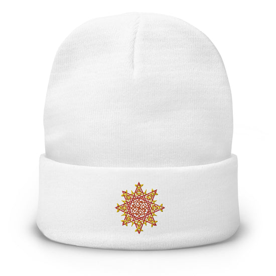 A white Xigfireon knit beanie embroidered with the Fire Colour iteration of the `Morning Star Fire` Celtic knot design.