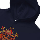 A zoomed-in view of a kids navy blue graphic hoodie featuring the Fire Colour iteration of the `Morning Star Fire` Celtic knot design.