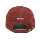 The back side of a burgundy Xigfireon vintage corduroy cap showing the embroidered Xigfireon logo.