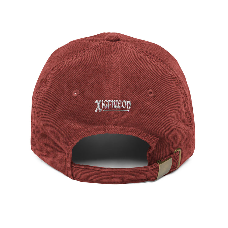 The back side of a burgundy Xigfireon vintage corduroy cap showing the embroidered Xigfireon logo.